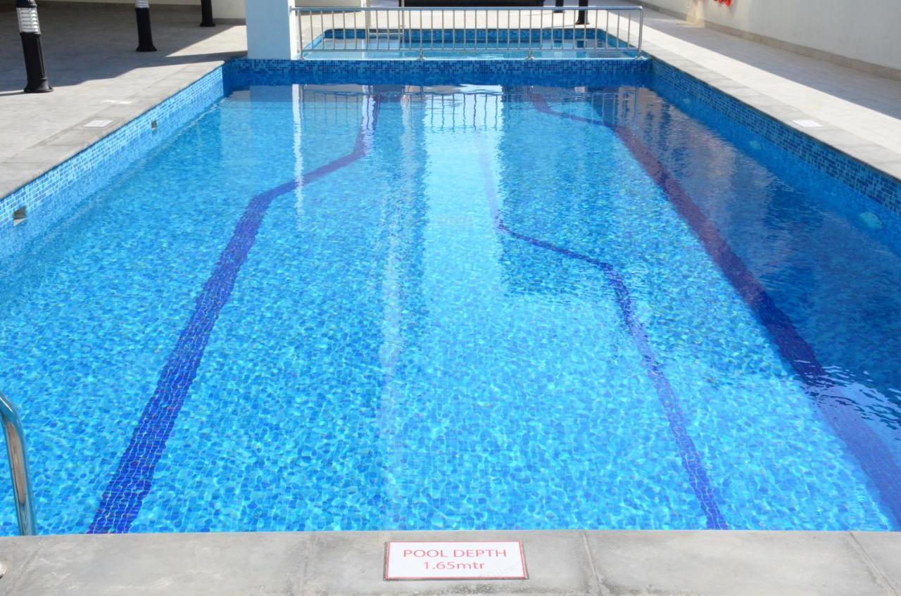 The Lodge Suites Manama Exteriör bild